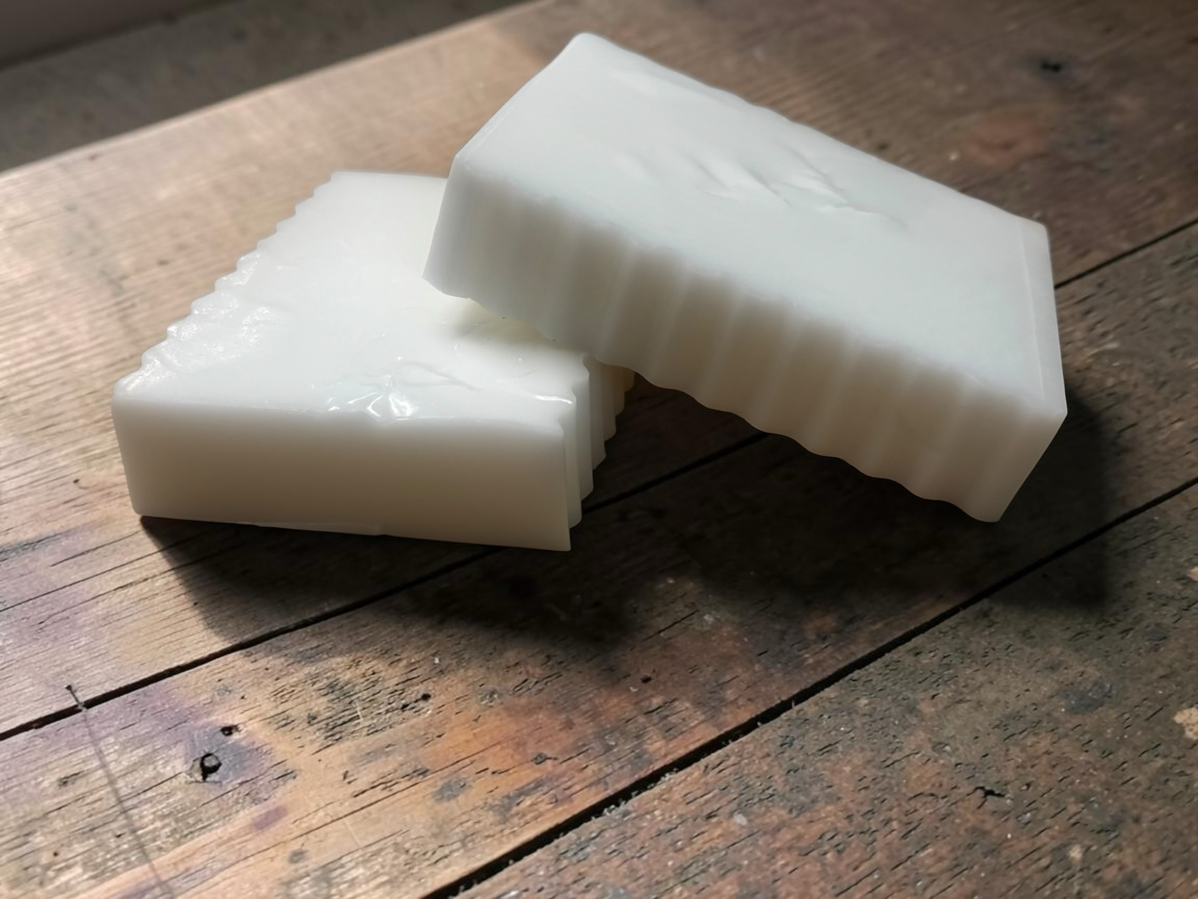 La Neve Soap and Beauty Care handcrafted white bar soap with wavy texture on sides for gentle cleansing.
